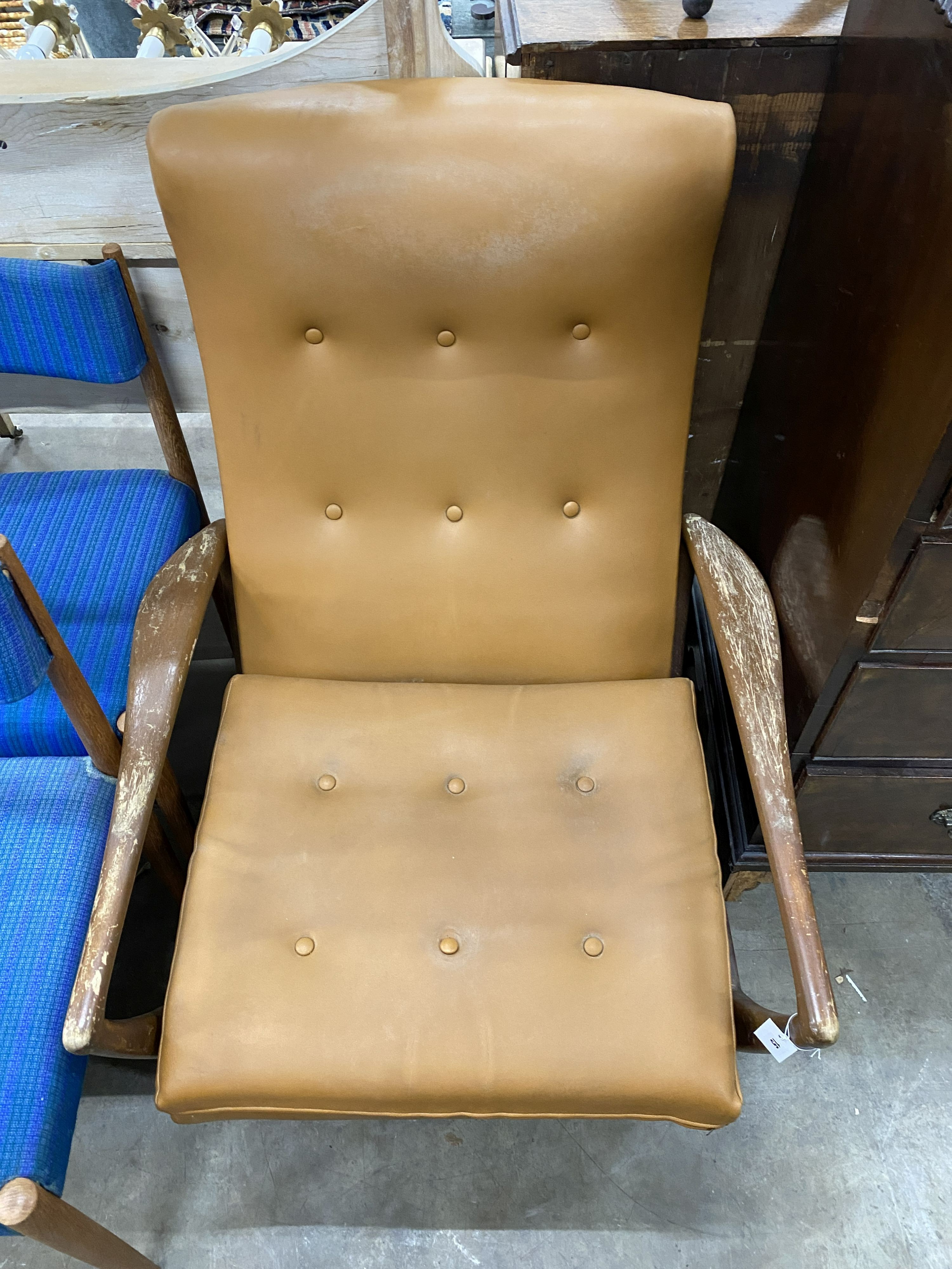 A mid century Parker Knoll model No. RK1020 reclining armchair, width 77cm, depth 88cm, height 94cm